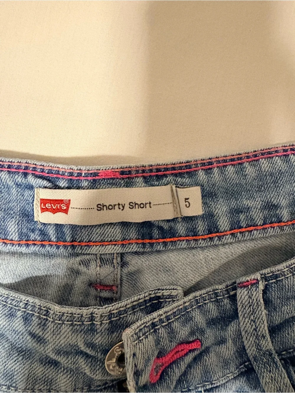 Vintage Levi's Light Blue Denim Shorts with Pink Lace Accent